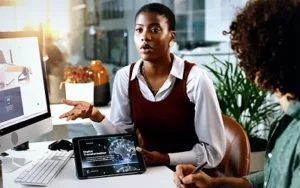 Behavioral Interviewing for Candidates: Land the Job Offer 11 Young professional answering questions confidently during a job interview