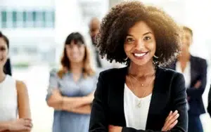 Customer Experience: Elevating Service and Emotional Connection 40 Confident businesswoman standing in front of her colleagues