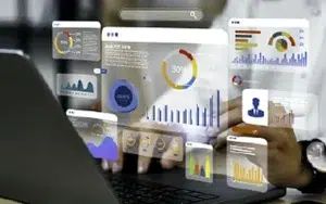 Data Analytics Fundamentals: Actionable Insights for Business Analysts 8 Laptop with floating data analytics charts and dashboards