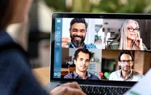 Writing and Presenting Briefings: Proven Techniques for Impact 30 Laptop showing a video conference with four participants