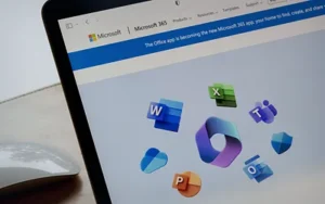 Microsoft 365 Essentials: Teams, SharePoint & OneDrive for Business Users 38 Laptop screen showing the Microsoft 365 app icons, including Word, Excel, Teams and Outlook