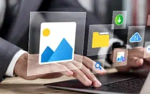 Generative AI for Presentations, Spreadsheets and Documents 24 Hands on a laptop with floating image, folder and cloud icons