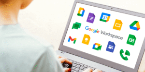 Business woman using multiple Google Workspace applications on laptop