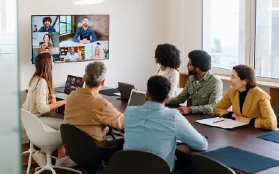 Team collaboration across locations using technology in a hybrid work environment.