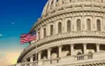 U.S. Capitol building with flag
