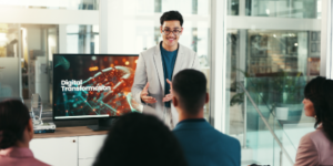 Presenter discussing digital transformation concepts.